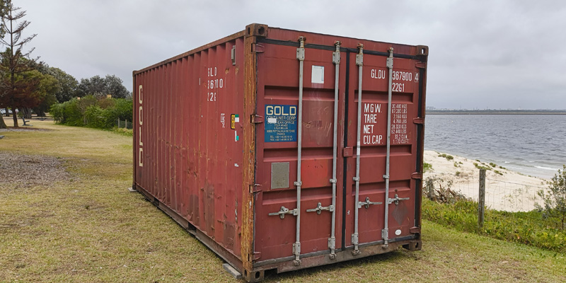 Shipping container to deter tree vandalism